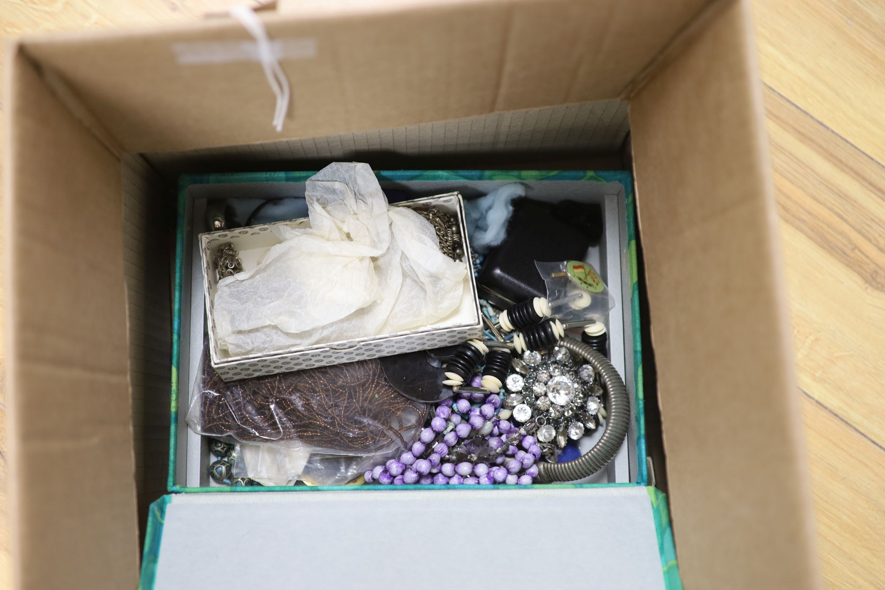 A large quantity of assorted mainly costume jewellery and a gentleman's steel Longines manual wind wrist watch.